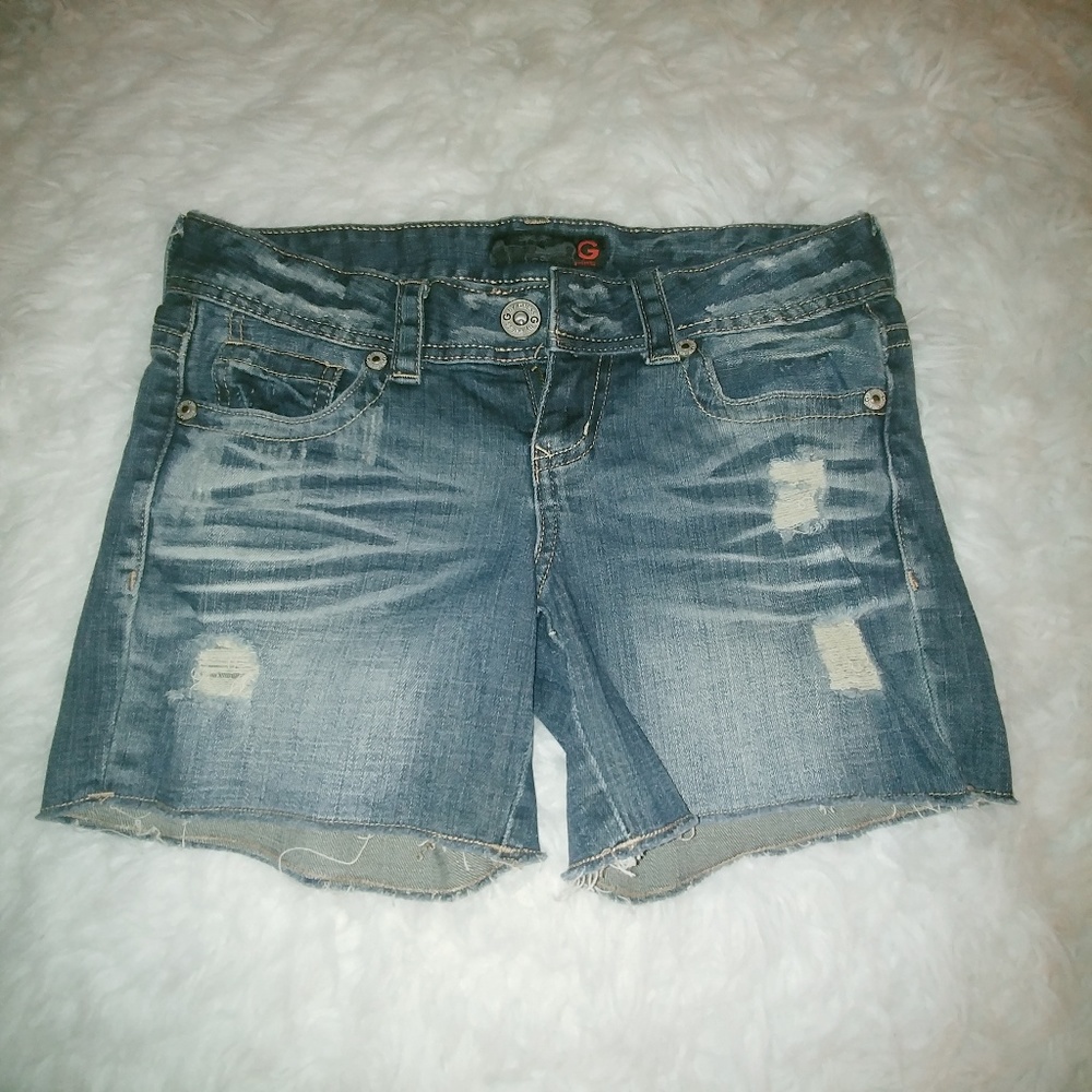 Guess low rise distressed jean shorts
